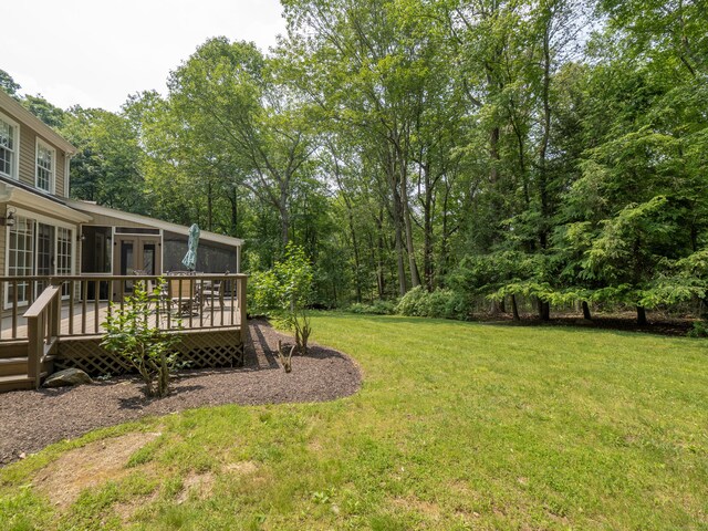 104 Scarlet Oak Dr, Wilton, CT 06897 - view of grassy yard with french doors and a deck