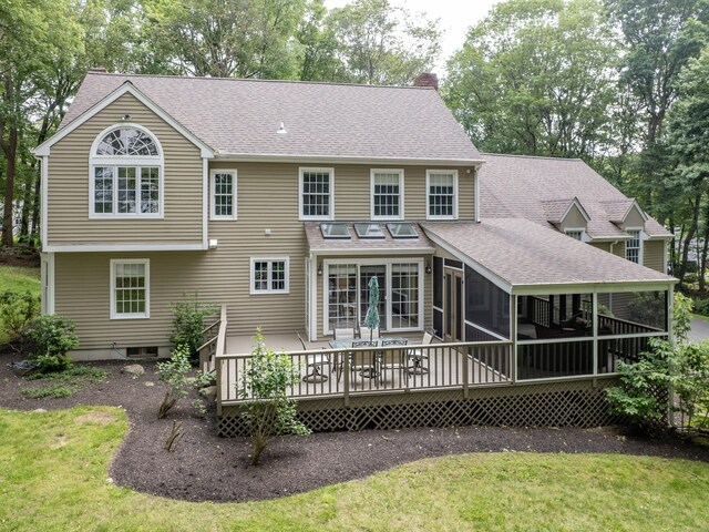 104 Scarlet Oak Dr, Wilton, CT 06897 - back of house featuring a chimney, a sunroom, roof with shingles, and a yard