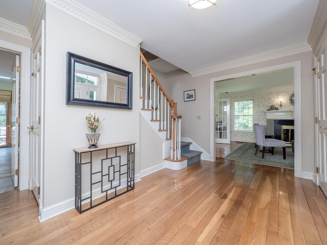 104 Scarlet Oak Dr, Wilton, CT 06897 - entrance foyer featuring light wood-type flooring, stairs, baseboards, and ornamental molding
