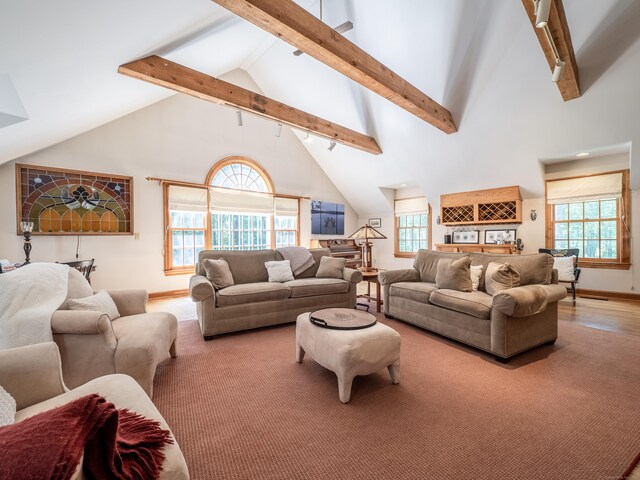 104 Scarlet Oak Dr, Wilton, CT 06897 - carpeted living area with beam ceiling, high vaulted ceiling, healthy amount of natural light, and baseboards