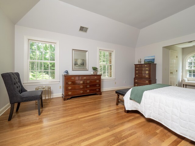 104 Scarlet Oak Dr, Wilton, CT 06897 - bedroom with light wood-style floors, vaulted ceiling, and baseboards