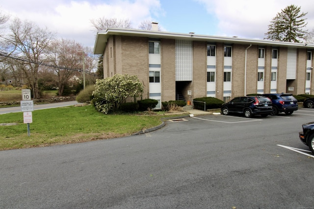 63 Niles Hill Rd Unit A4, New London, CT 06320 - view of property featuring uncovered parking