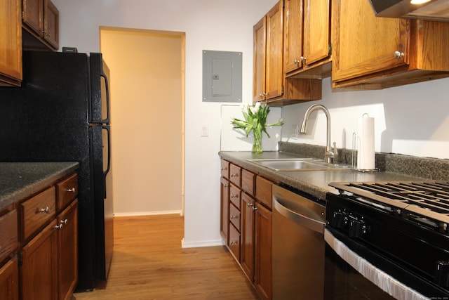 63 Niles Hill Rd Unit A4, New London, CT 06320 - kitchen featuring electric panel, black appliances, a sink, and dark countertops