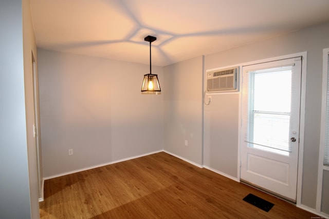 63 Niles Hill Rd Unit A4, New London, CT 06320 - foyer entrance with wood finished floors, baseboards, and a wall mounted air conditioner