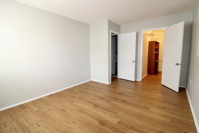 63 Niles Hill Rd Unit A4, New London, CT 06320 - unfurnished bedroom with light wood-style floors and baseboards