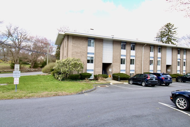 63 Niles Hill Rd Unit A4, New London, CT 06320 - view of building exterior featuring uncovered parking