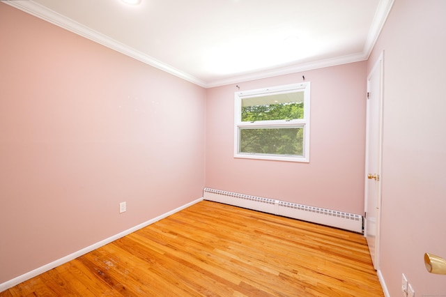 46 Columbine Dr, Trumbull, CT 06611 - empty room featuring a baseboard heating unit, light wood-type flooring, baseboards, and crown molding