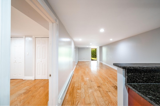 46 Columbine Dr, Trumbull, CT 06611 - hall with a baseboard heating unit, light wood-type flooring, recessed lighting, and baseboards
