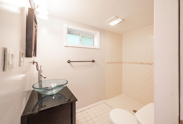 46 Columbine Dr, Trumbull, CT 06611 - full bathroom featuring toilet, tiled shower, vanity, baseboards, and tile patterned floors