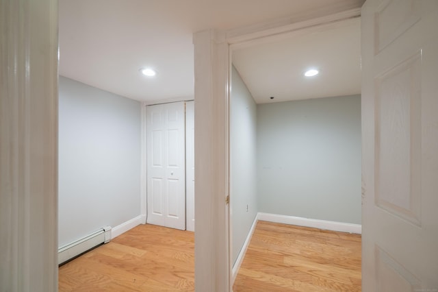 46 Columbine Dr, Trumbull, CT 06611 - corridor with baseboard heating, wood finished floors, baseboards, and recessed lighting