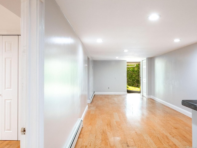 46 Columbine Dr, Trumbull, CT 06611 - empty room with baseboard heating, recessed lighting, and light wood finished floors