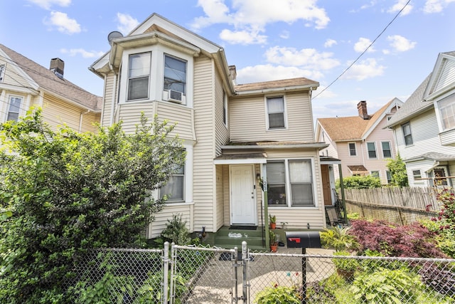 23 Seeley St, Bridgeport, CT 06605 - view of front of property featuring a gate, a fenced front yard, and cooling unit