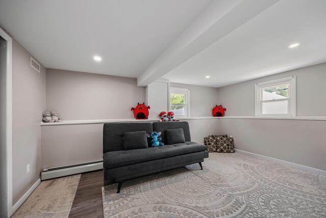 7 Pleasant St, Wolcott, CT 06716 - living area featuring a baseboard radiator, wood finished floors, and recessed lighting