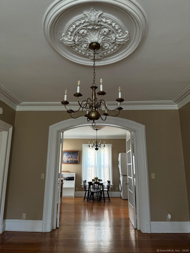 201 Center St, West Haven, CT 06516 - dining space featuring a chandelier, ornamental molding, wood finished floors, and baseboards