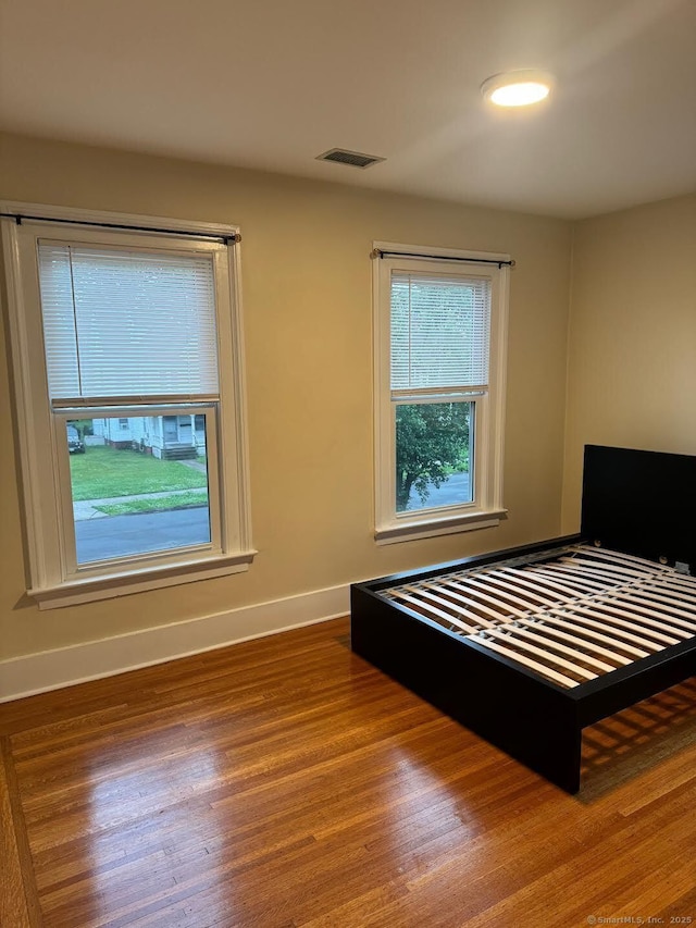 201 Center St, West Haven, CT 06516 - bedroom featuring wood finished floors and baseboards