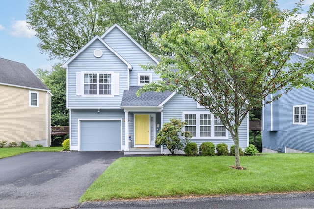 14 Linden Hts Unit 14, Norwalk, CT 06851 - traditional-style home featuring asphalt driveway, a garage, a front yard, and roof with shingles
