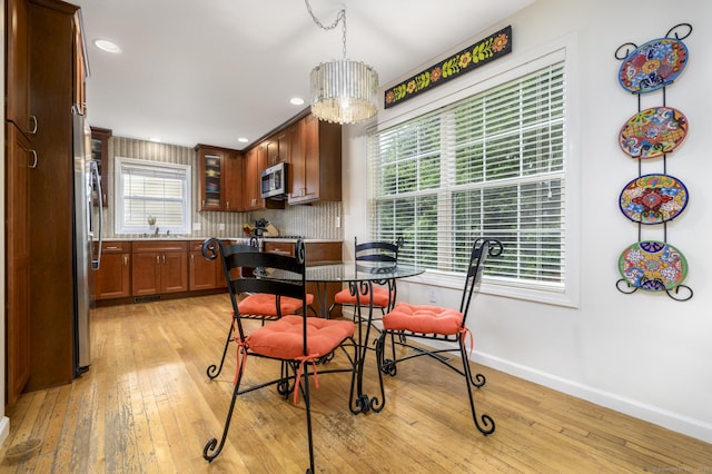 14 Linden Hts Unit 14, Norwalk, CT 06851 - dining space featuring light wood finished floors and recessed lighting