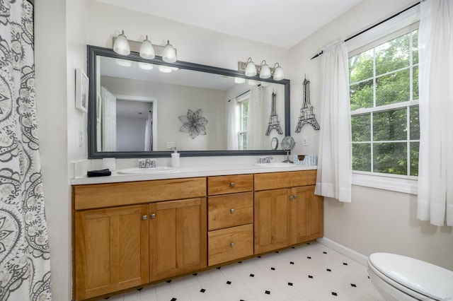 14 Linden Hts Unit 14, Norwalk, CT 06851 - full bathroom with double vanity, plenty of natural light, and tile patterned floors
