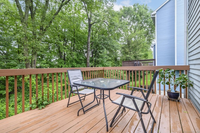 14 Linden Hts Unit 14, Norwalk, CT 06851 - wooden terrace featuring outdoor dining area and view of scattered trees