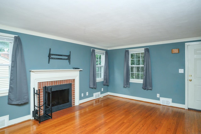 60 Old Mill Rd, Middletown, CT 06457 - unfurnished living room featuring wood finished floors, a fireplace, and crown molding