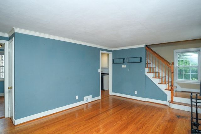 60 Old Mill Rd, Middletown, CT 06457 - unfurnished living room featuring wood finished floors, stairs, and ornamental molding