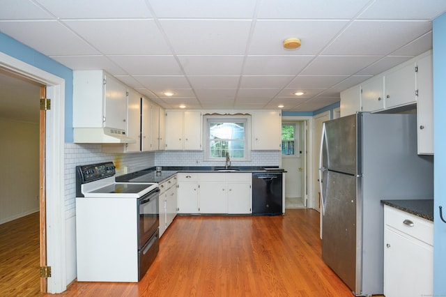 60 Old Mill Rd, Middletown, CT 06457 - kitchen with dishwasher, electric range, freestanding refrigerator, under cabinet range hood, and light wood-style flooring