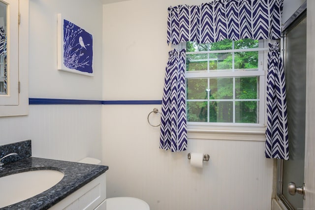 60 Old Mill Rd, Middletown, CT 06457 - bathroom featuring vanity, a wainscoted wall, plenty of natural light, and a shower