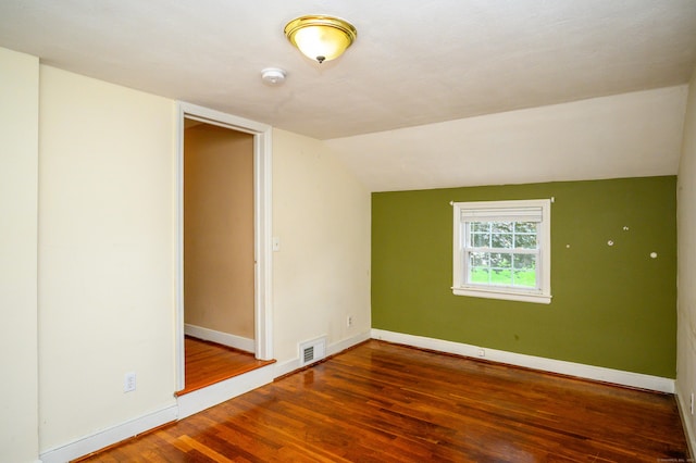 60 Old Mill Rd, Middletown, CT 06457 - unfurnished room with wood finished floors, vaulted ceiling, and a smoke detector
