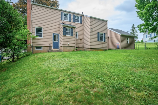 60 Old Mill Rd, Middletown, CT 06457 - rear view of house featuring a chimney