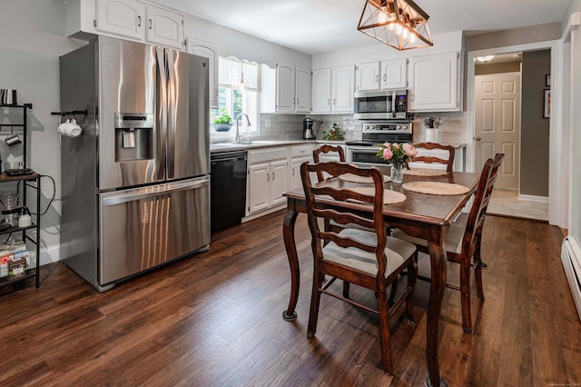 320 Spruce St, Cheshire, CT 06410 - kitchen featuring appliances with stainless steel finishes, white cabinets, and tasteful backsplash