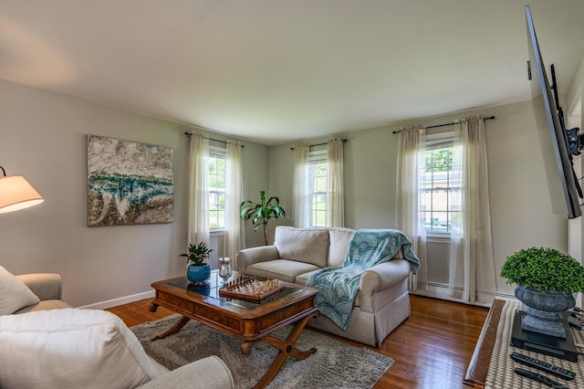 320 Spruce St, Cheshire, CT 06410 - living area with wood finished floors and baseboard heating