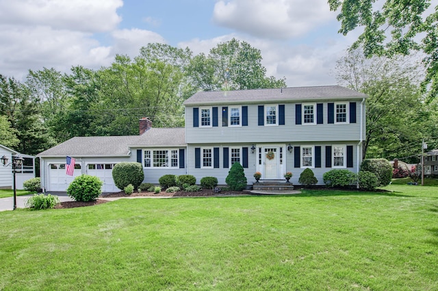 320 Spruce St, Cheshire, CT 06410 - colonial house with a garage, a chimney, a front yard, and a shingled roof
