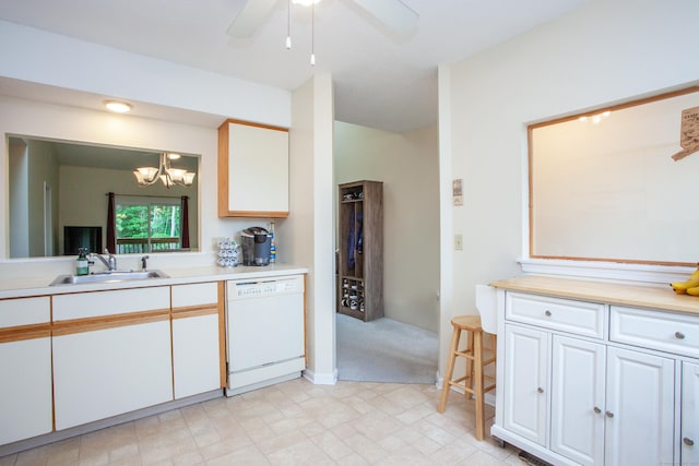 38 Simsbury Lndg Unit 38, Simsbury, CT 06070 - kitchen with white dishwasher, light countertops, white cabinets, a chandelier, and a ceiling fan