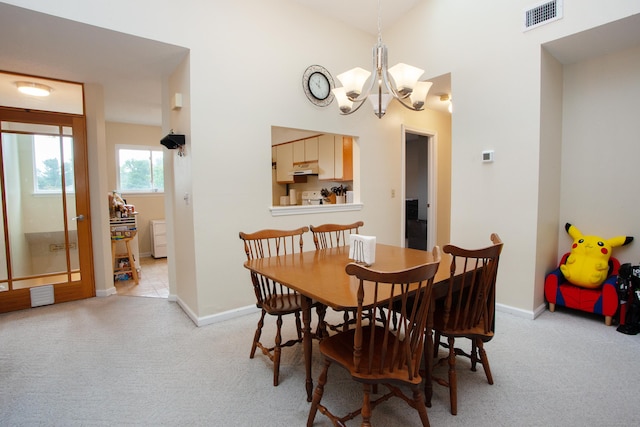 38 Simsbury Lndg Unit 38, Simsbury, CT 06070 - dining area featuring light colored carpet and a chandelier