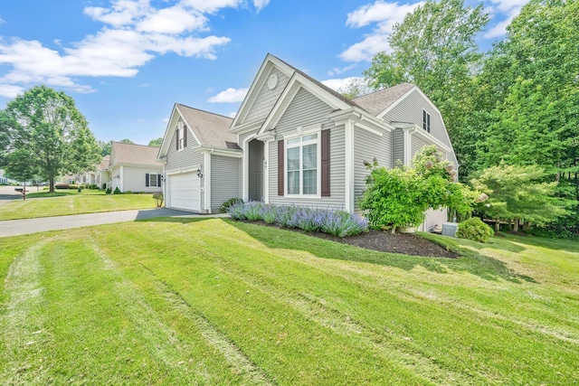 111 Thorn Hollow Rd, Cheshire, CT 06410 - view of front of property featuring driveway, a front yard, a garage, and a shingled roof