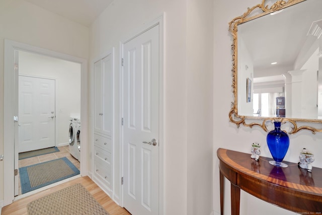 111 Thorn Hollow Rd, Cheshire, CT 06410 - hallway with washer and clothes dryer, light wood-style floors, and recessed lighting