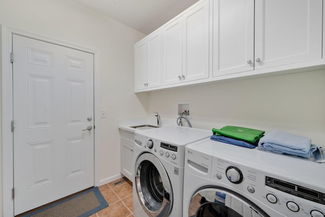 111 Thorn Hollow Rd, Cheshire, CT 06410 - laundry area with washer and dryer, cabinet space, light tile patterned floors, and baseboards