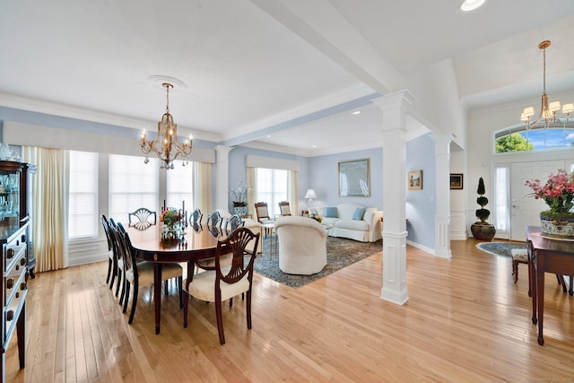 111 Thorn Hollow Rd, Cheshire, CT 06410 - dining room featuring a chandelier, ornate columns, light wood-style flooring, crown molding, and beam ceiling