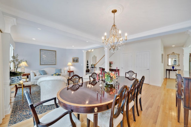 111 Thorn Hollow Rd, Cheshire, CT 06410 - dining space featuring a chandelier, light wood-style flooring, decorative columns, recessed lighting, and crown molding
