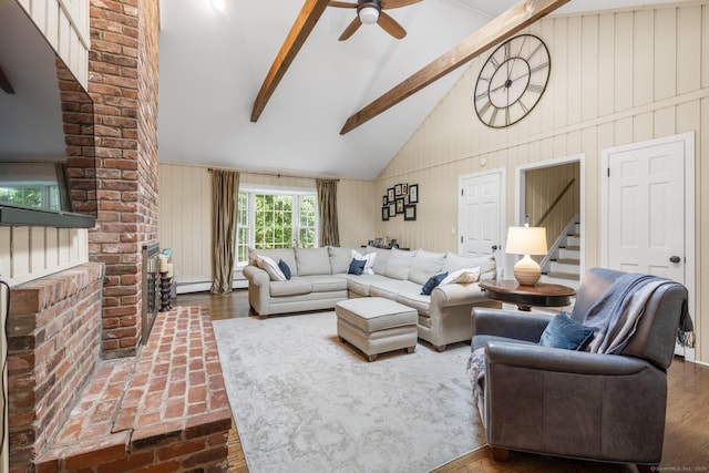 68 Mopus Bridge Rd, Ridgefield, CT 06877 - living room with beamed ceiling, ceiling fan, high vaulted ceiling, wooden walls, and stairs