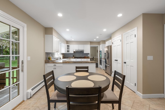 68 Mopus Bridge Rd, Ridgefield, CT 06877 - dining area with a baseboard radiator and recessed lighting