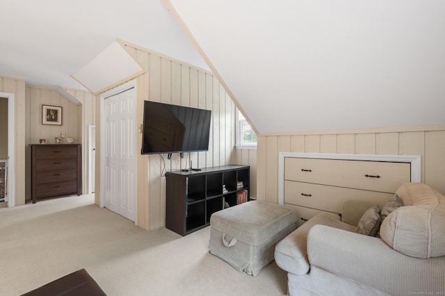 68 Mopus Bridge Rd, Ridgefield, CT 06877 - living area featuring lofted ceiling, carpet floors, and wooden walls