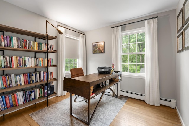 68 Mopus Bridge Rd, Ridgefield, CT 06877 - office with wood finished floors and a baseboard radiator
