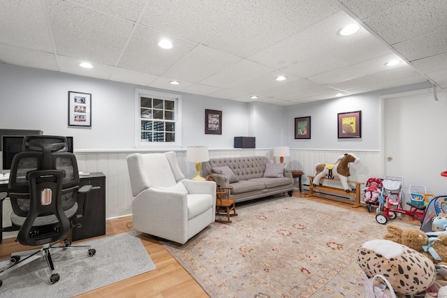68 Mopus Bridge Rd, Ridgefield, CT 06877 - living area with wood finished floors, wainscoting, recessed lighting, and a paneled ceiling