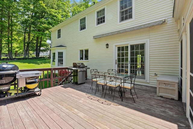 68 Mopus Bridge Rd, Ridgefield, CT 06877 - wooden terrace featuring area for grilling, outdoor dining area, and a yard