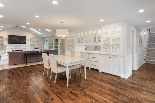 133 Buttery Rd, New Canaan, CT 06840 - dining area with dark wood-style floors, stairway, a skylight, recessed lighting, and vaulted ceiling