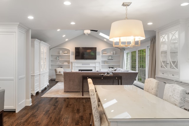 133 Buttery Rd, New Canaan, CT 06840 - kitchen with built in features, dark wood-type flooring, recessed lighting, a fireplace, and vaulted ceiling