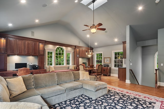 133 Buttery Rd, New Canaan, CT 06840 - living area with light wood-style flooring, high vaulted ceiling, a ceiling fan, a skylight, and recessed lighting