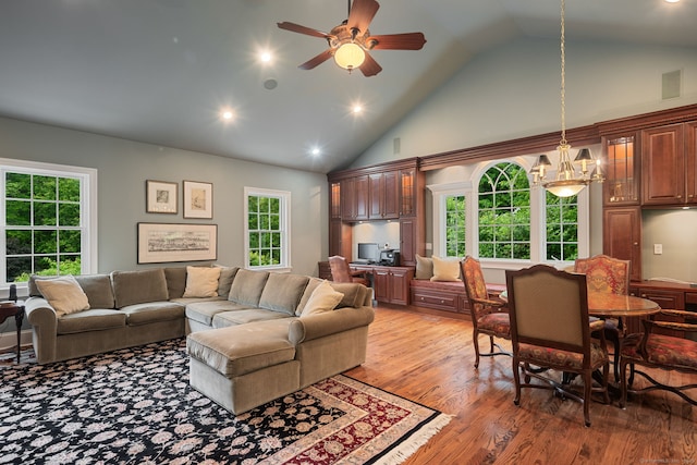 133 Buttery Rd, New Canaan, CT 06840 - living area with high vaulted ceiling, ceiling fan, light wood-type flooring, a chandelier, and recessed lighting