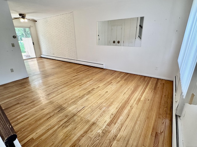24 Woodward Ave Apt 19, New Haven, CT 06512 - spare room with wood finished floors, baseboard heating, and a ceiling fan